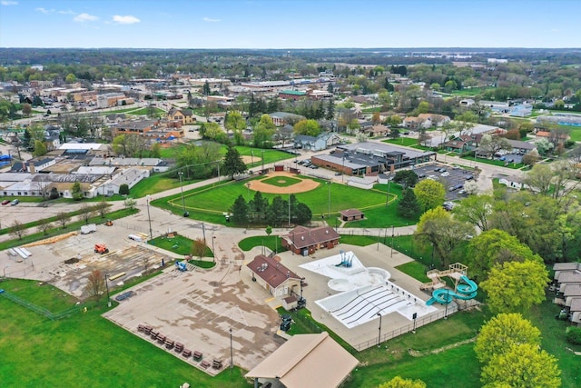 birds eye view of property with a residential view