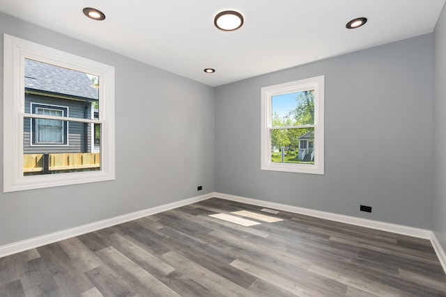 16910 Lincoln St, Hazel Crest, IL 60429 - unfurnished room with wood finished floors, baseboards, and recessed lighting