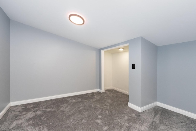16910 Lincoln St, Hazel Crest, IL 60429 - spare room featuring carpet, lofted ceiling, and baseboards