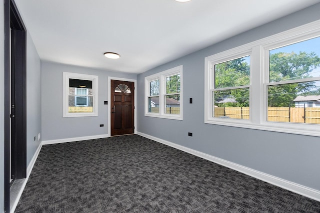 16910 Lincoln St, Hazel Crest, IL 60429 - entryway featuring baseboards and dark carpet