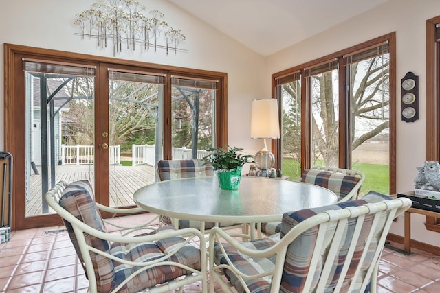 17 Thistle Trl, Caledonia, IL 61011 - dining area with vaulted ceiling and light tile patterned floors