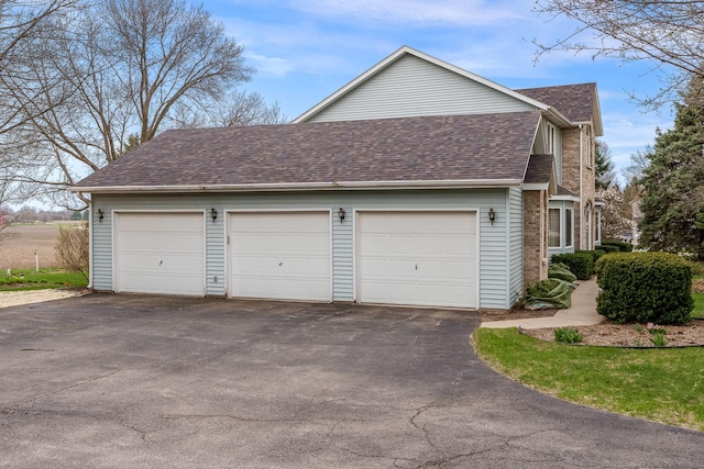 17 Thistle Trl, Caledonia, IL 61011 - view of side of property with a shingled roof