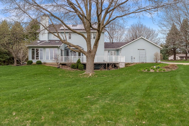 17 Thistle Trl, Caledonia, IL 61011 - back of house featuring a wooden deck and a yard