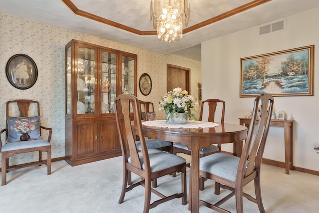 17 Thistle Trl, Caledonia, IL 61011 - dining area with light colored carpet, wallpapered walls, a chandelier, crown molding, and a tray ceiling