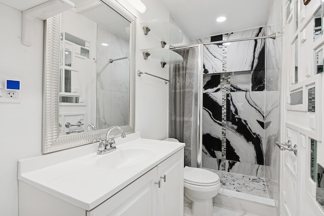 full bathroom featuring vanity, recessed lighting, a stall shower, and toilet