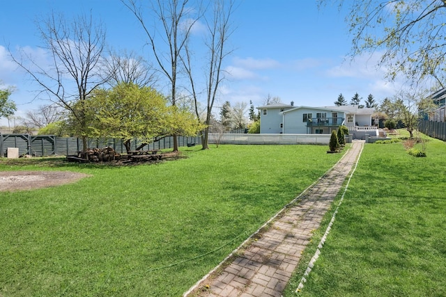 view of yard with a fenced backyard
