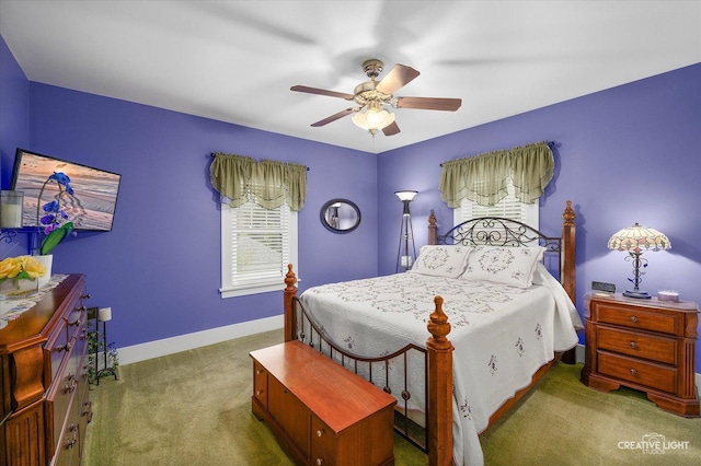 bedroom featuring carpet floors, baseboards, and ceiling fan