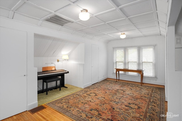 interior space featuring visible vents and wood finished floors