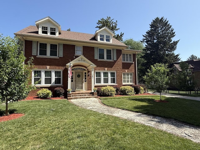 1402 W Lincoln Blvd, Freeport, IL 61032 - view of front of home with brick siding and a front lawn