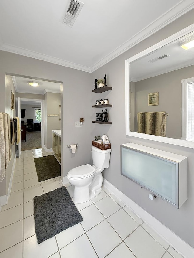 1402 W Lincoln Blvd, Freeport, IL 61032 - bathroom with ornamental molding and tile patterned floors