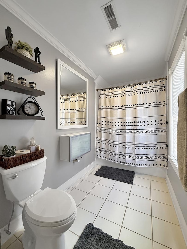1402 W Lincoln Blvd, Freeport, IL 61032 - bathroom featuring ornamental molding and tile patterned flooring