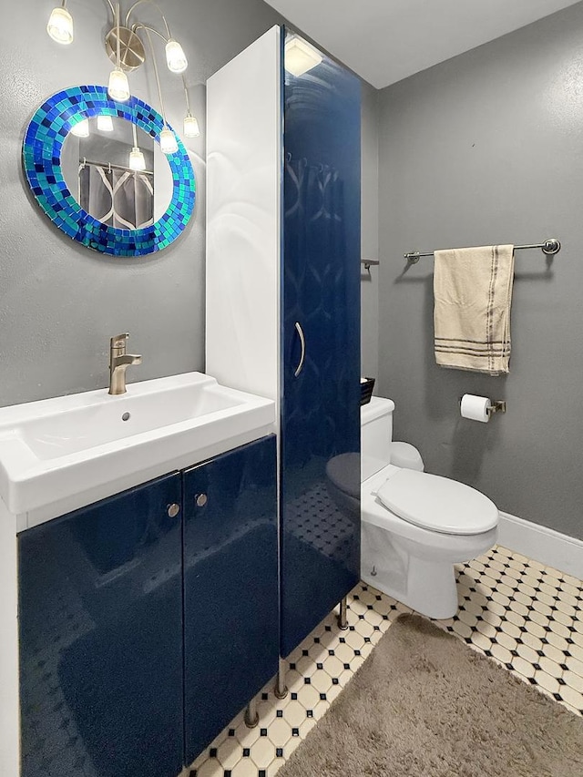1402 W Lincoln Blvd, Freeport, IL 61032 - bathroom featuring vanity and toilet