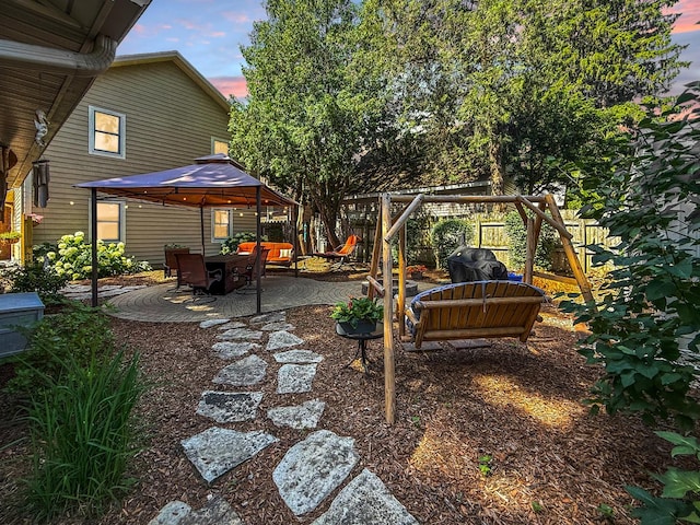 1402 W Lincoln Blvd, Freeport, IL 61032 - view of yard featuring a patio, a gazebo, and a playground