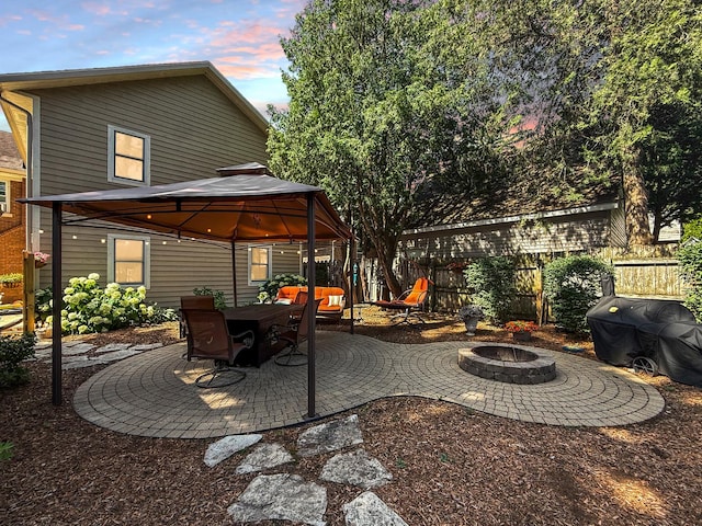 1402 W Lincoln Blvd, Freeport, IL 61032 - view of patio / terrace featuring a gazebo, an outdoor fire pit, and a grill