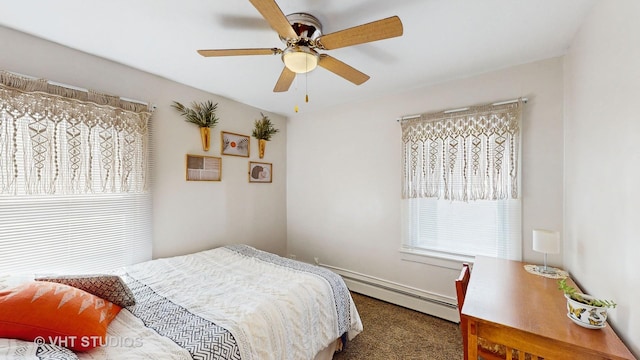 carpeted bedroom featuring ceiling fan and baseboard heating