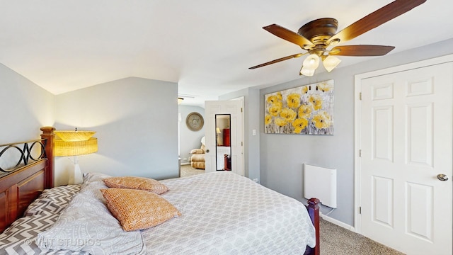 bedroom with baseboards, carpet flooring, and a ceiling fan