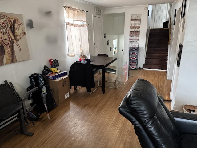 office space featuring crown molding and wood finished floors