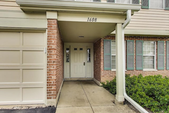 1608 Pennsbury Ct Unit A2, Wheeling, IL 60090 - property entrance featuring brick siding
