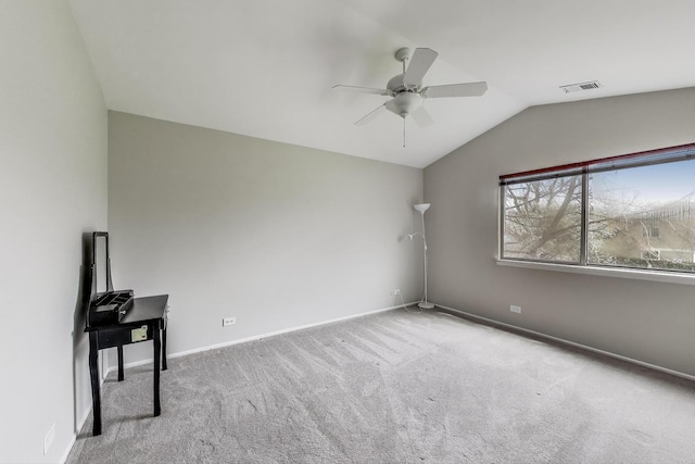 1608 Pennsbury Ct Unit A2, Wheeling, IL 60090 - spare room featuring a ceiling fan, carpet flooring, vaulted ceiling, and baseboards
