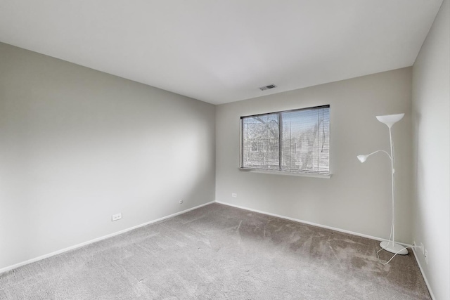 1608 Pennsbury Ct Unit A2, Wheeling, IL 60090 - carpeted empty room with baseboards