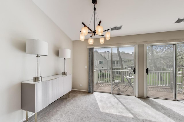 1608 Pennsbury Ct Unit A2, Wheeling, IL 60090 - unfurnished dining area with carpet, a chandelier, baseboards, and lofted ceiling
