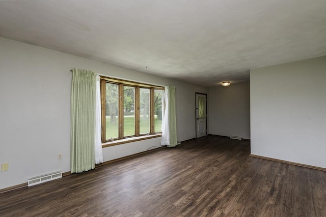 301 Garnett Ave, Winthrop Harbor, IL 60096 - empty room featuring wood finished floors and baseboards