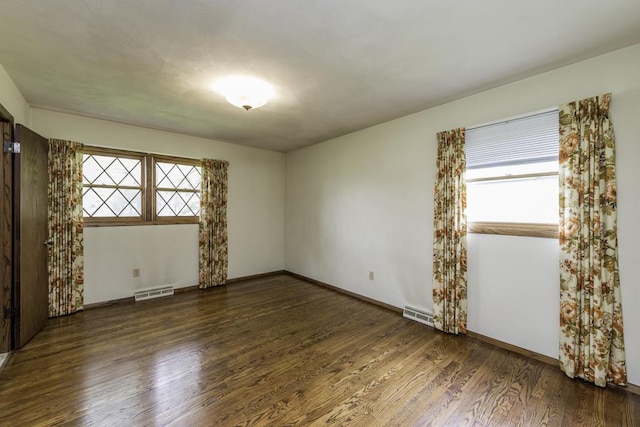 301 Garnett Ave, Winthrop Harbor, IL 60096 - spare room featuring wood finished floors and baseboards