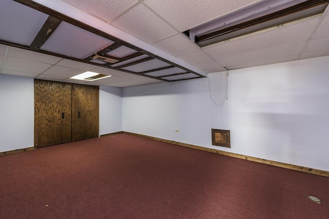 301 Garnett Ave, Winthrop Harbor, IL 60096 - finished below grade area with a drop ceiling, carpet floors, and baseboards