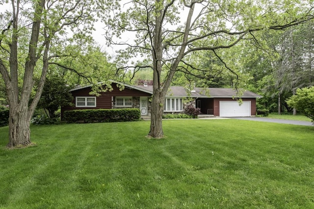 301 Garnett Ave, Winthrop Harbor, IL 60096 - single story home with driveway, an attached garage, and a front lawn