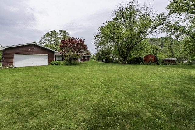 301 Garnett Ave, Winthrop Harbor, IL 60096 - view of grassy yard with an attached garage