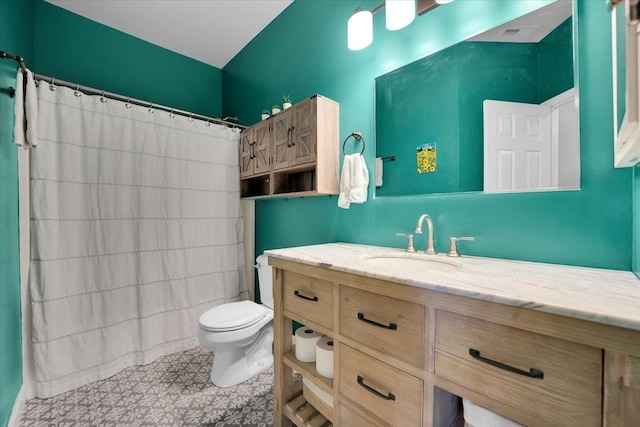 bathroom with vanity, a shower with curtain, and toilet