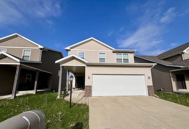 1406 Myrtle Beach Ave, Champaign, IL 61822 - craftsman house featuring brick siding, driveway, a front lawn, and a garage
