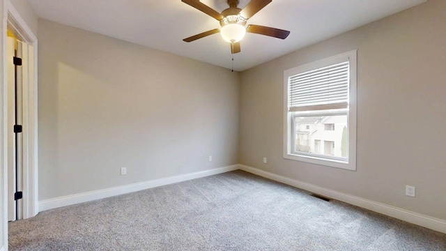 1406 Myrtle Beach Ave, Champaign, IL 61822 - unfurnished room featuring carpet floors and a ceiling fan