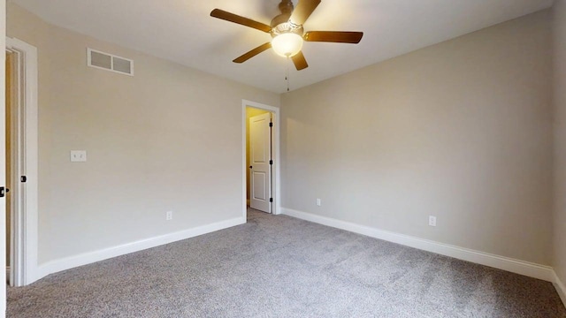 1406 Myrtle Beach Ave, Champaign, IL 61822 - carpeted empty room with baseboards and a ceiling fan