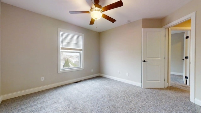 1406 Myrtle Beach Ave, Champaign, IL 61822 - empty room with carpet floors and ceiling fan
