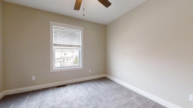 1406 Myrtle Beach Ave, Champaign, IL 61822 - empty room featuring carpet flooring and a ceiling fan