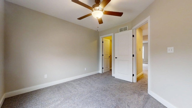 1406 Myrtle Beach Ave, Champaign, IL 61822 - unfurnished bedroom featuring carpet floors and ceiling fan