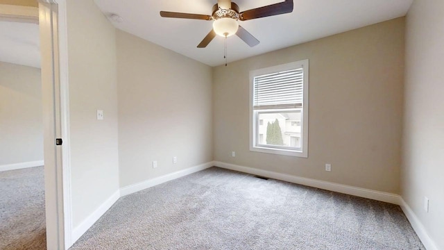 1406 Myrtle Beach Ave, Champaign, IL 61822 - spare room featuring carpet and ceiling fan