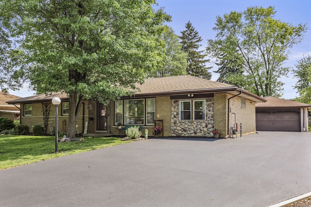 11341 S Nagle Ave, Worth, IL 60482 - view of front of property with a front yard, an outdoor structure, and roof with shingles