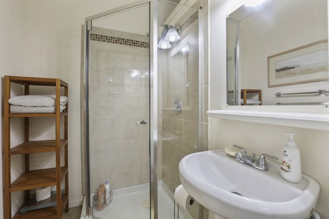 11341 S Nagle Ave, Worth, IL 60482 - bathroom featuring a sink and a stall shower