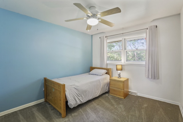 11341 S Nagle Ave, Worth, IL 60482 - bedroom with dark colored carpet, baseboards, and a ceiling fan