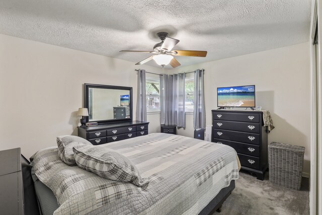 11341 S Nagle Ave, Worth, IL 60482 - carpeted bedroom featuring a textured ceiling and ceiling fan