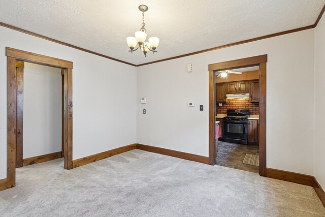 2228 8th St, Rockford, IL 61104 - spare room with an inviting chandelier, carpet flooring, baseboards, and crown molding