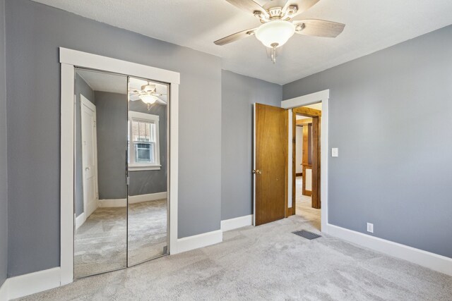 2228 8th St, Rockford, IL 61104 - unfurnished bedroom featuring visible vents, carpet, baseboards, and a closet