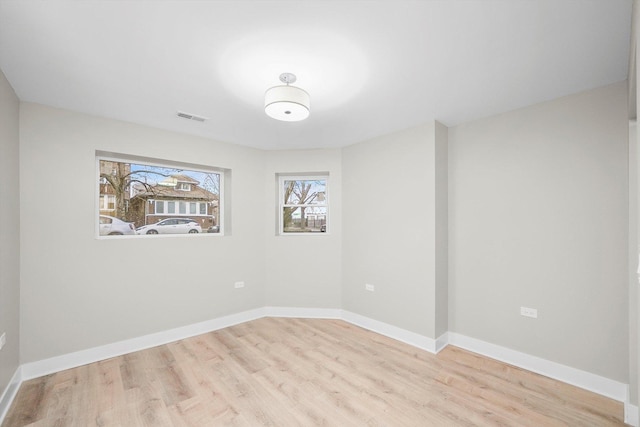4825 W Oakdale Ave, Chicago, IL 60641 - unfurnished room featuring wood finished floors and baseboards
