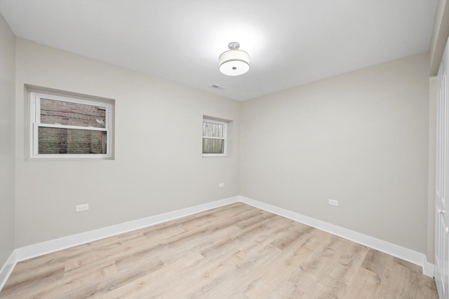 4825 W Oakdale Ave, Chicago, IL 60641 - unfurnished room featuring light wood-type flooring and baseboards