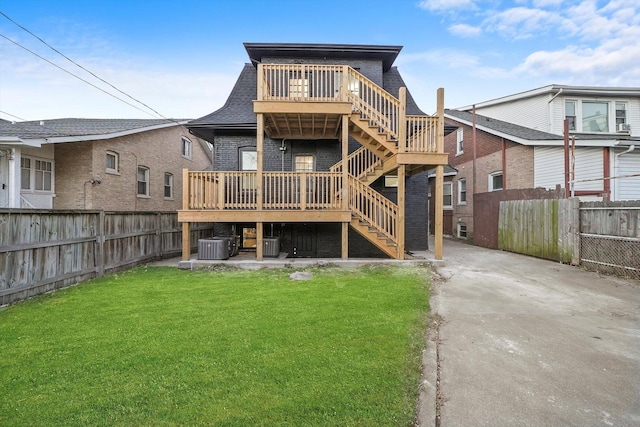 4825 W Oakdale Ave, Chicago, IL 60641 - rear view of property with stairs, a deck, brick siding, and central AC