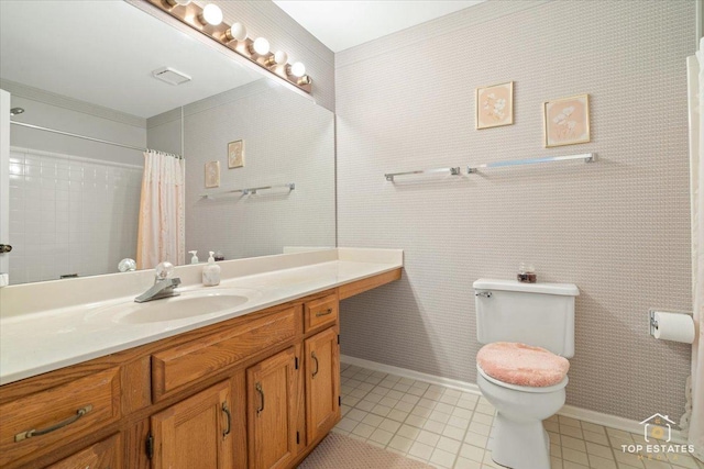 bathroom with vanity, curtained shower, toilet, baseboards, and tile patterned floors