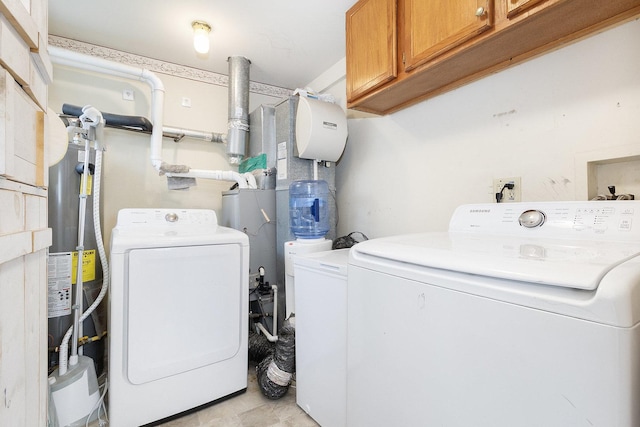 14958 Kildare Ave, Midlothian, IL 60445 - laundry area featuring washer and dryer, cabinet space, and water heater