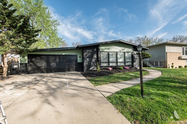 251 N Pleasant Dr, Glenwood, IL 60425 - single story home featuring an attached garage, brick siding, a front yard, and concrete driveway